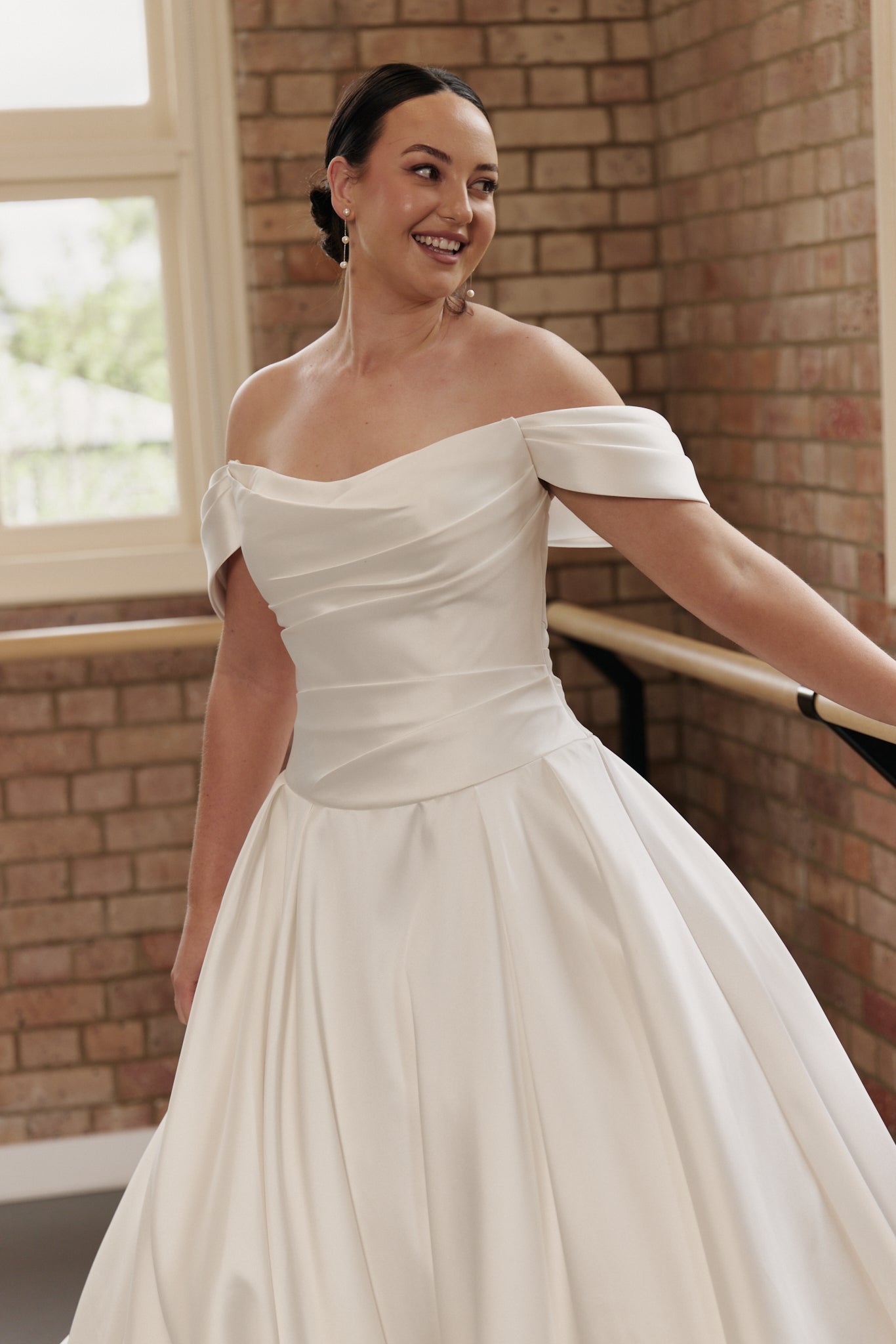 Close-up of ruched structured corset bodice on the Antonia wedding dress in satin Mikado