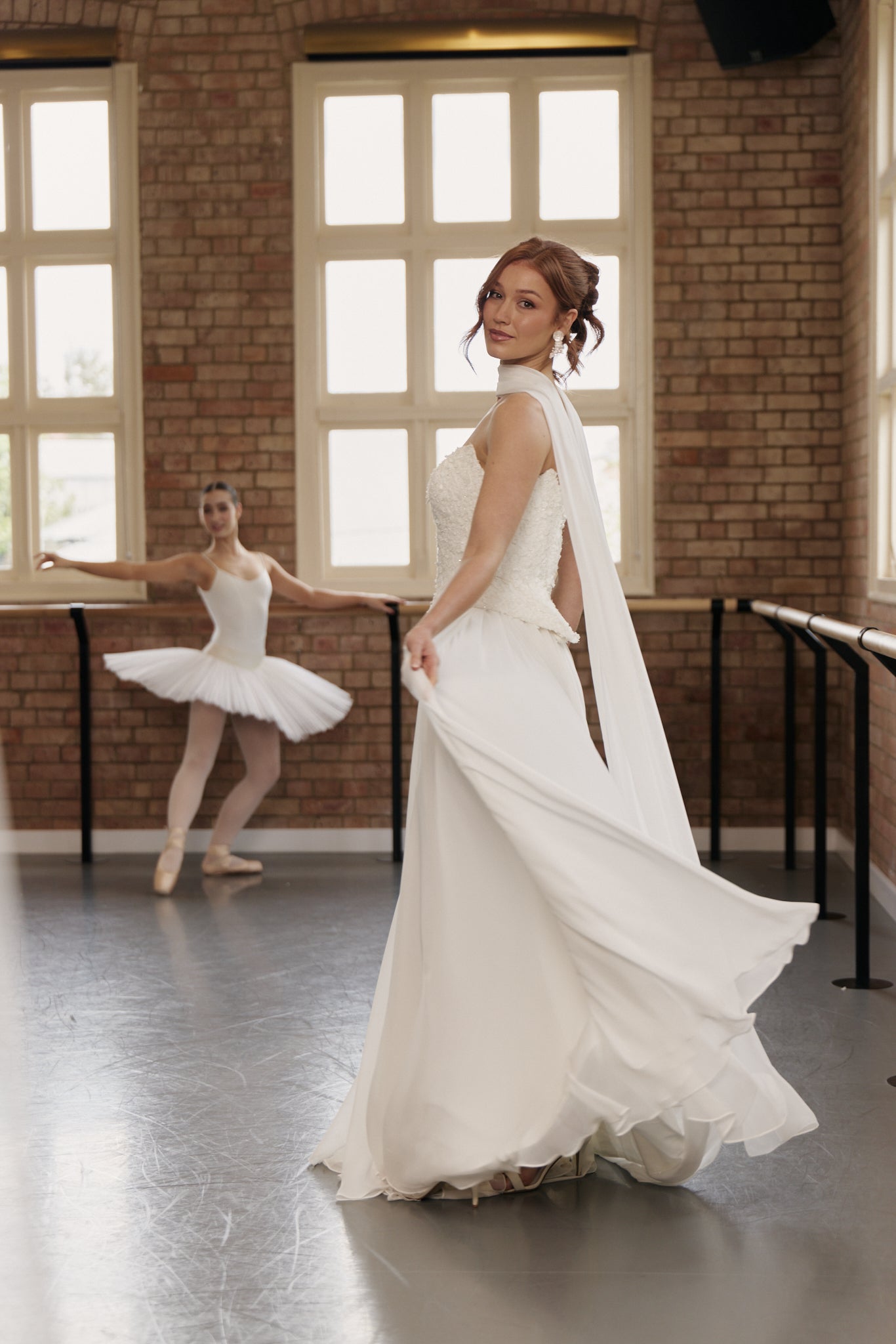 Daisy wedding bodice in textured lace with soft bouson hips, pictured gathered chiffon skirt and scarf, side view.