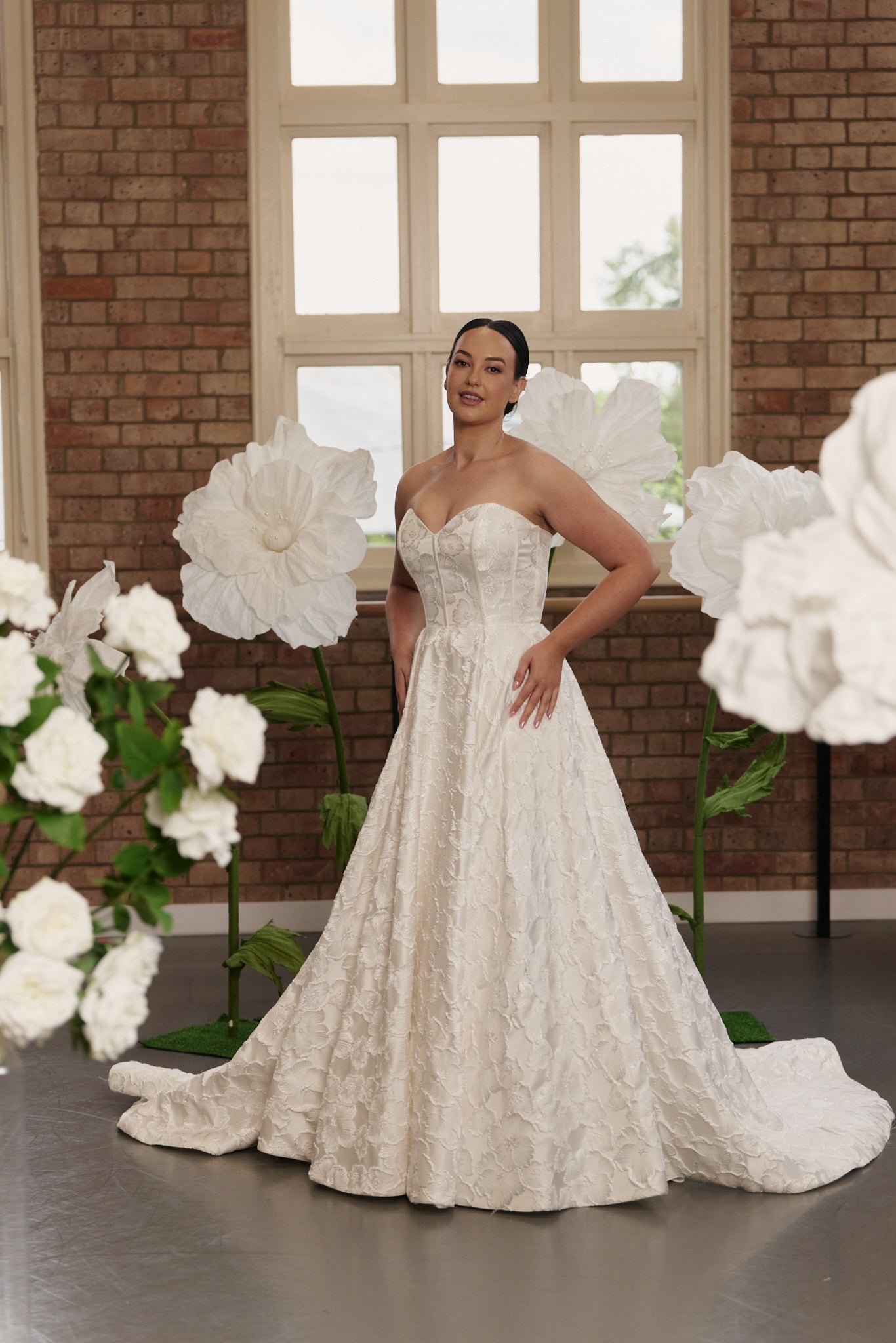 Front view of the Savannah wedding gown with sweetheart neckline, structured bodice, and full princess skirt in Mikado or jacquard.