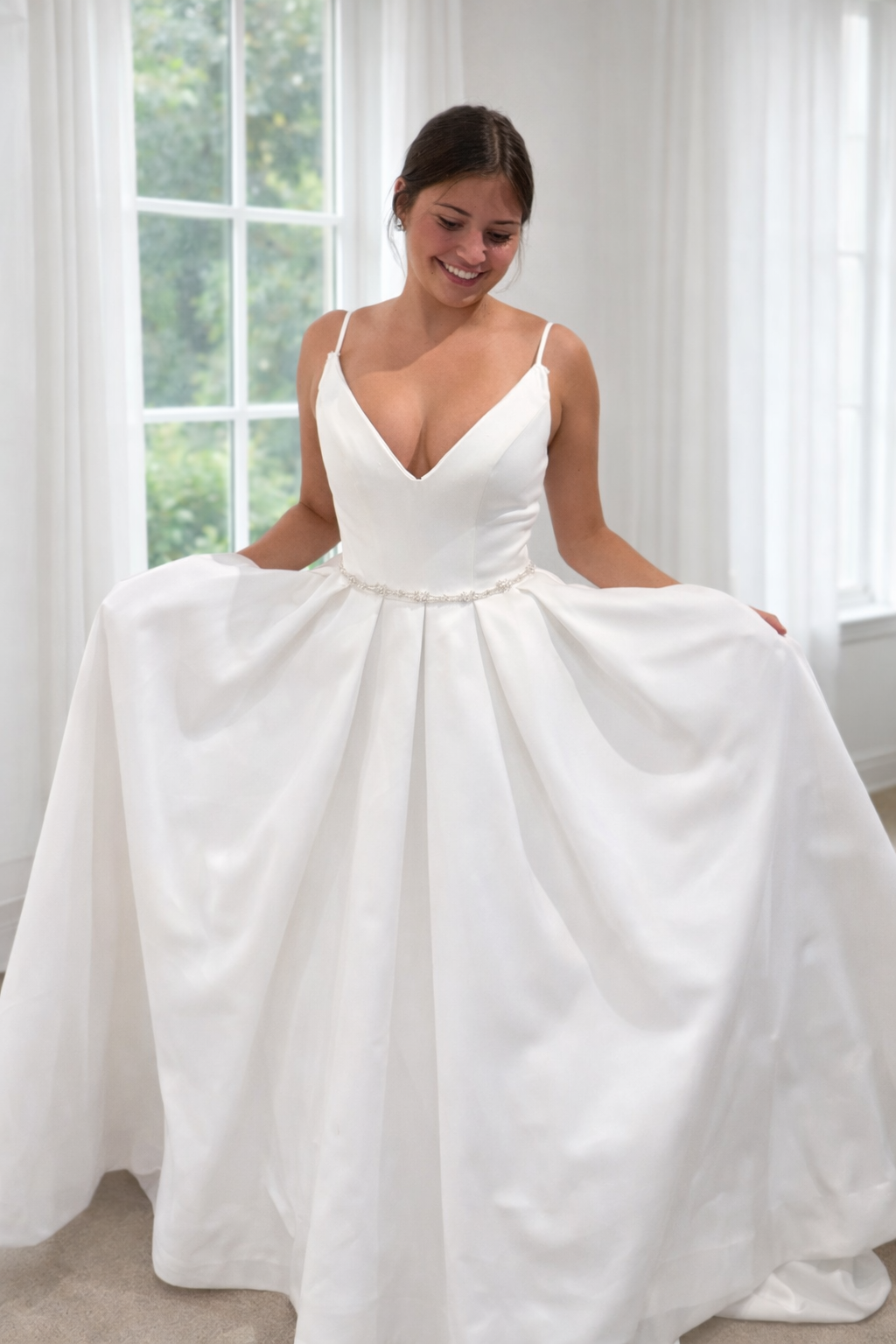 Antoinette minimalist bridal gown with spaghetti straps and structured waist pleats