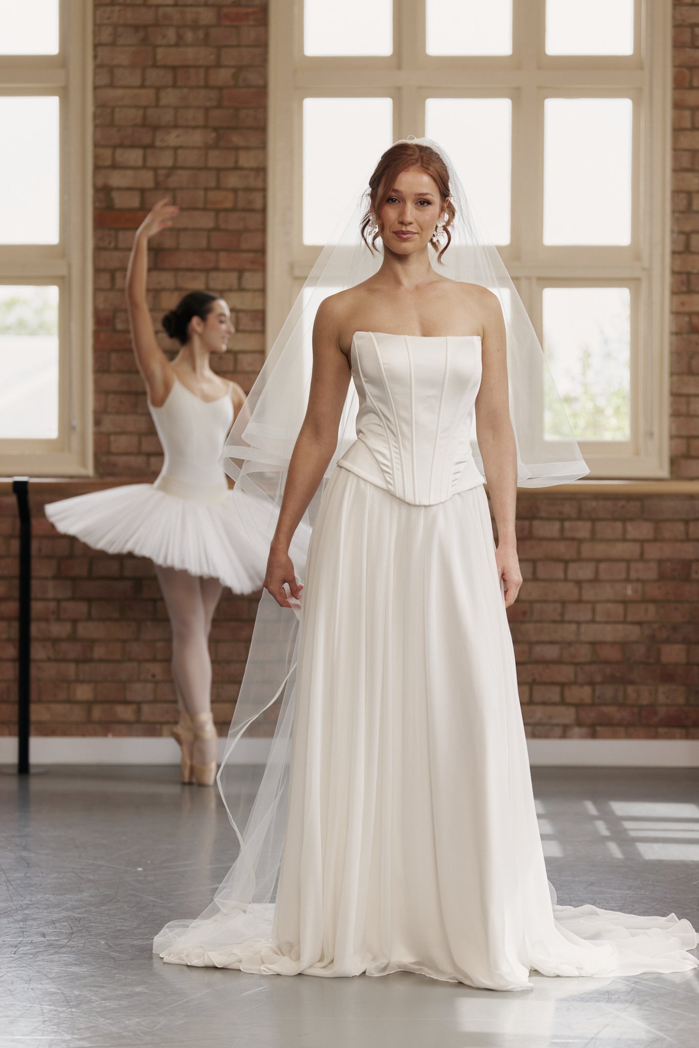 Sleek satin bridal bodice with internal boning, creating a tailored silhouette for the contemporary bride.