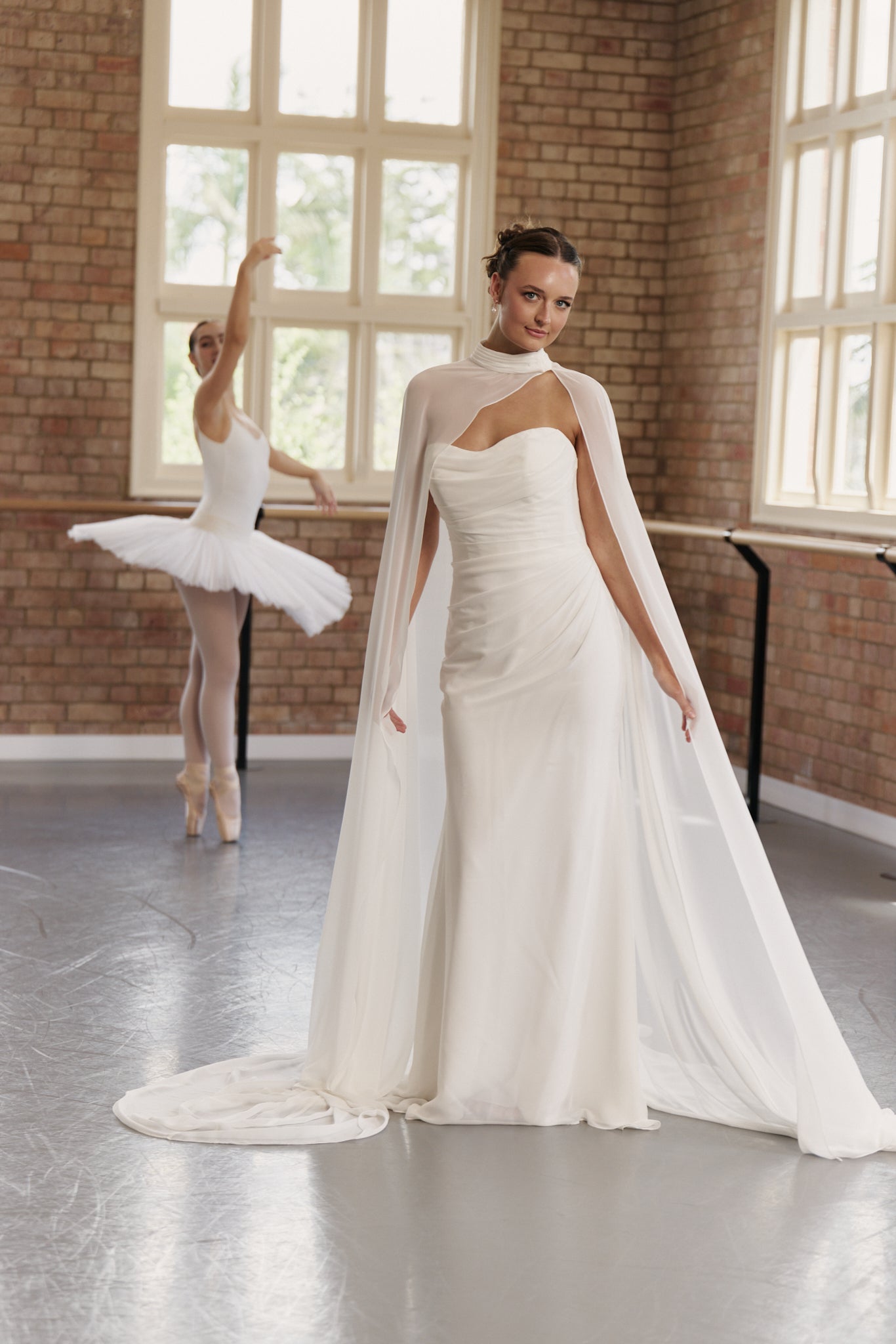 Bridgette strapless wedding gown in soft chiffon with ruched bodice and mermaid skirt.