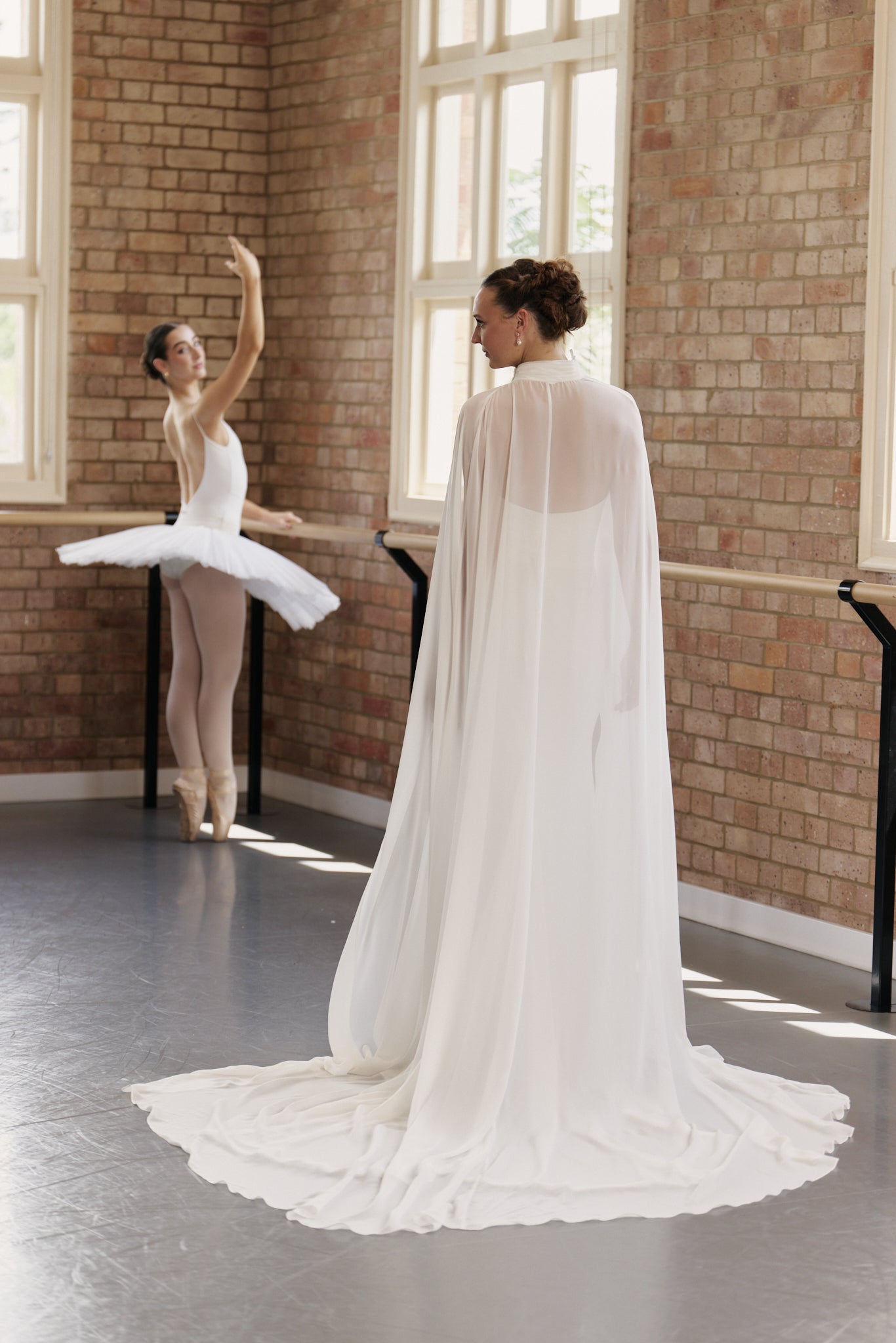 Back of Bridgette strapless straight wedding gown in soft chiffon.