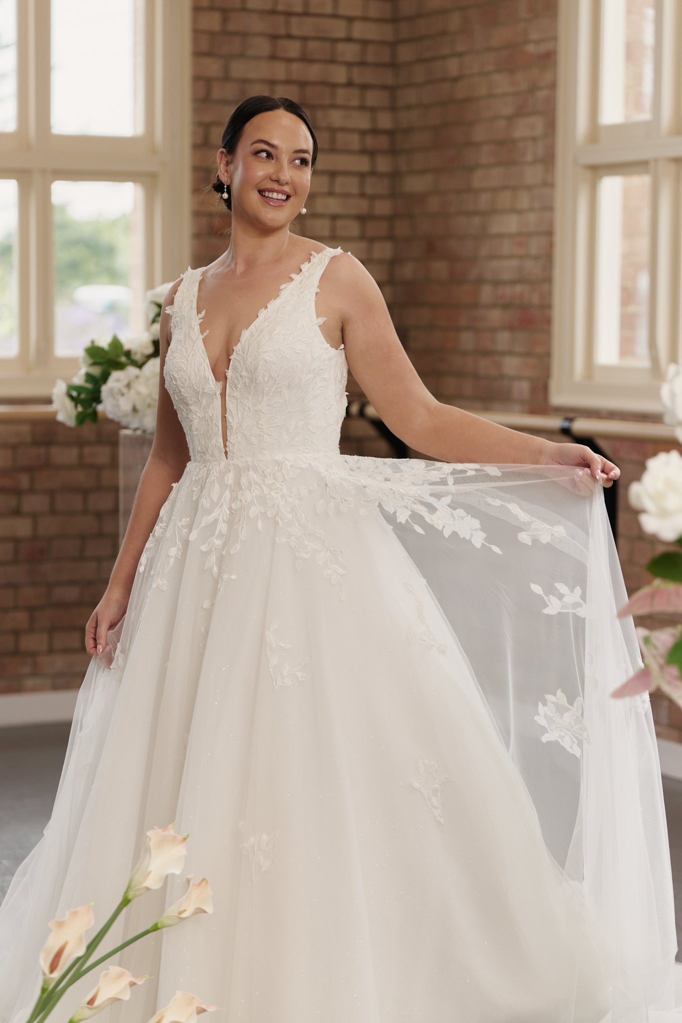 Close-up of embroidered bodice on the Celine V-neck princess ball gown wedding dress.