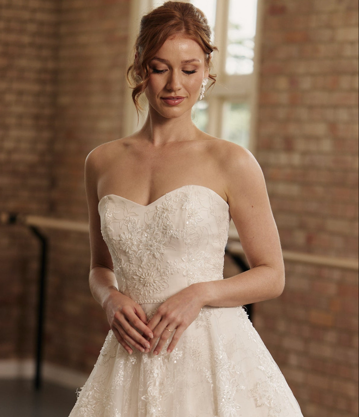 Close-up of the Elodie dress with intricate beading and strapless sweetheart neckline detailing