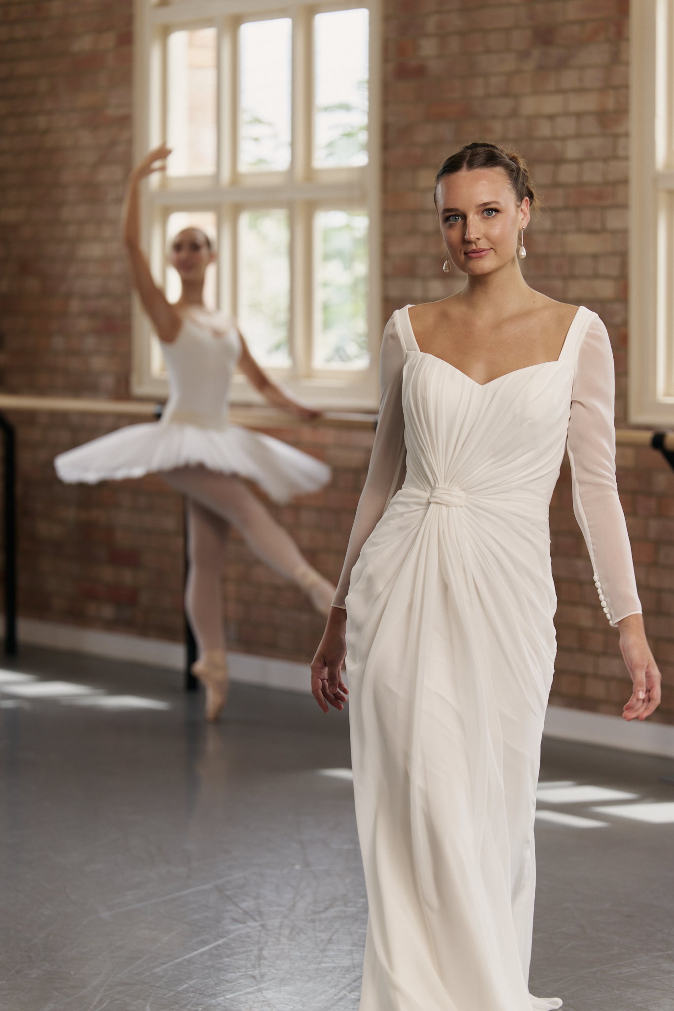 Gigi wedding dress in soft chiffon, sheath style with long sleeves and a sweetheart neckline