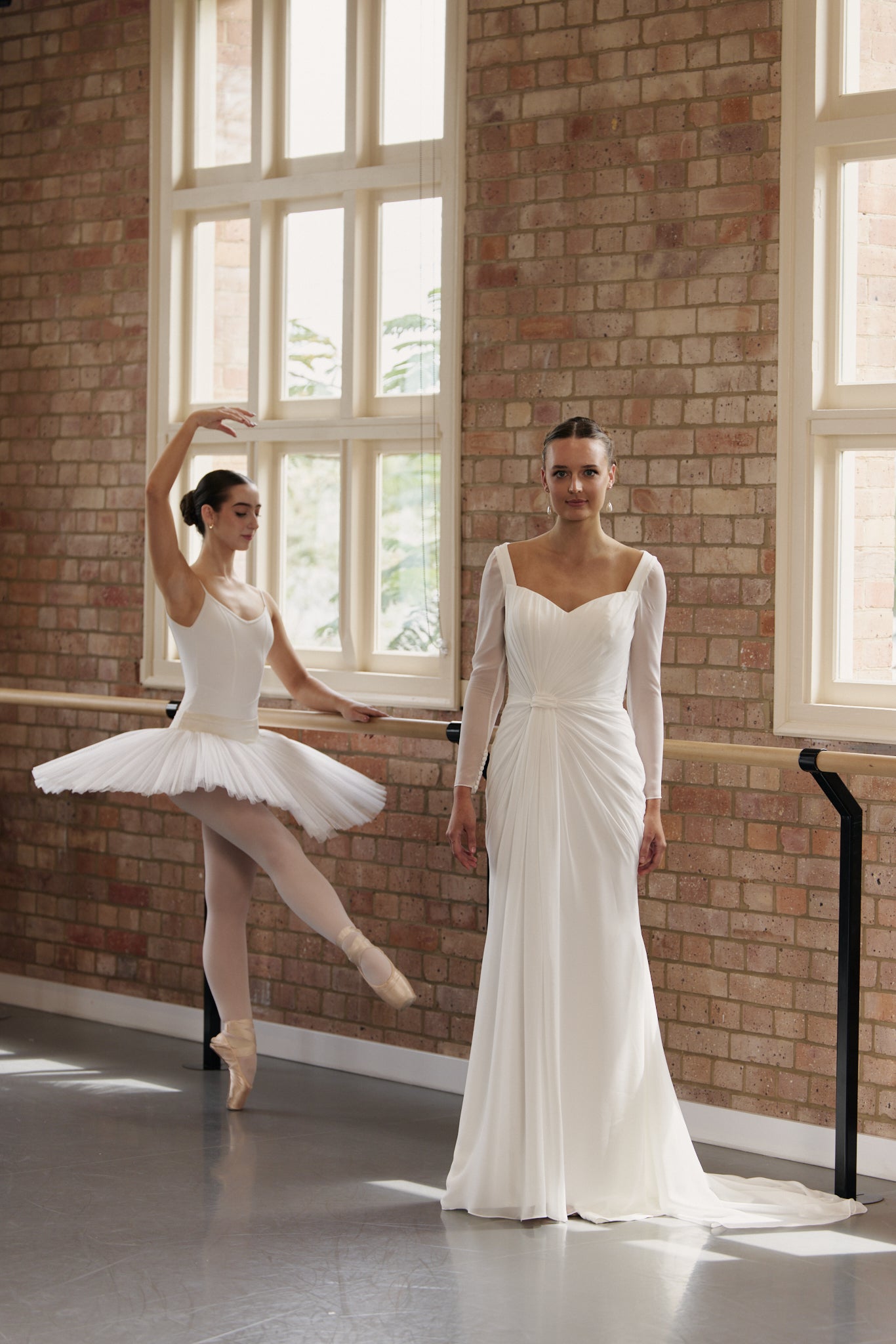 Gigi wedding dress in soft chiffon, sheath style with long sleeves and a sweetheart neckline.