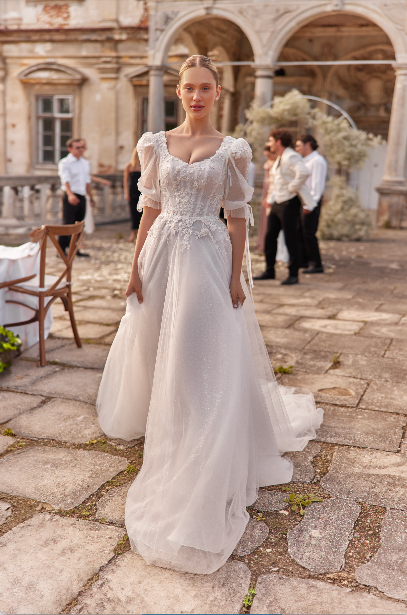 Loren Wedding Gown with lace corset bodice, sparkly tulle skirt, a-line and full silhouette, long skirt with train