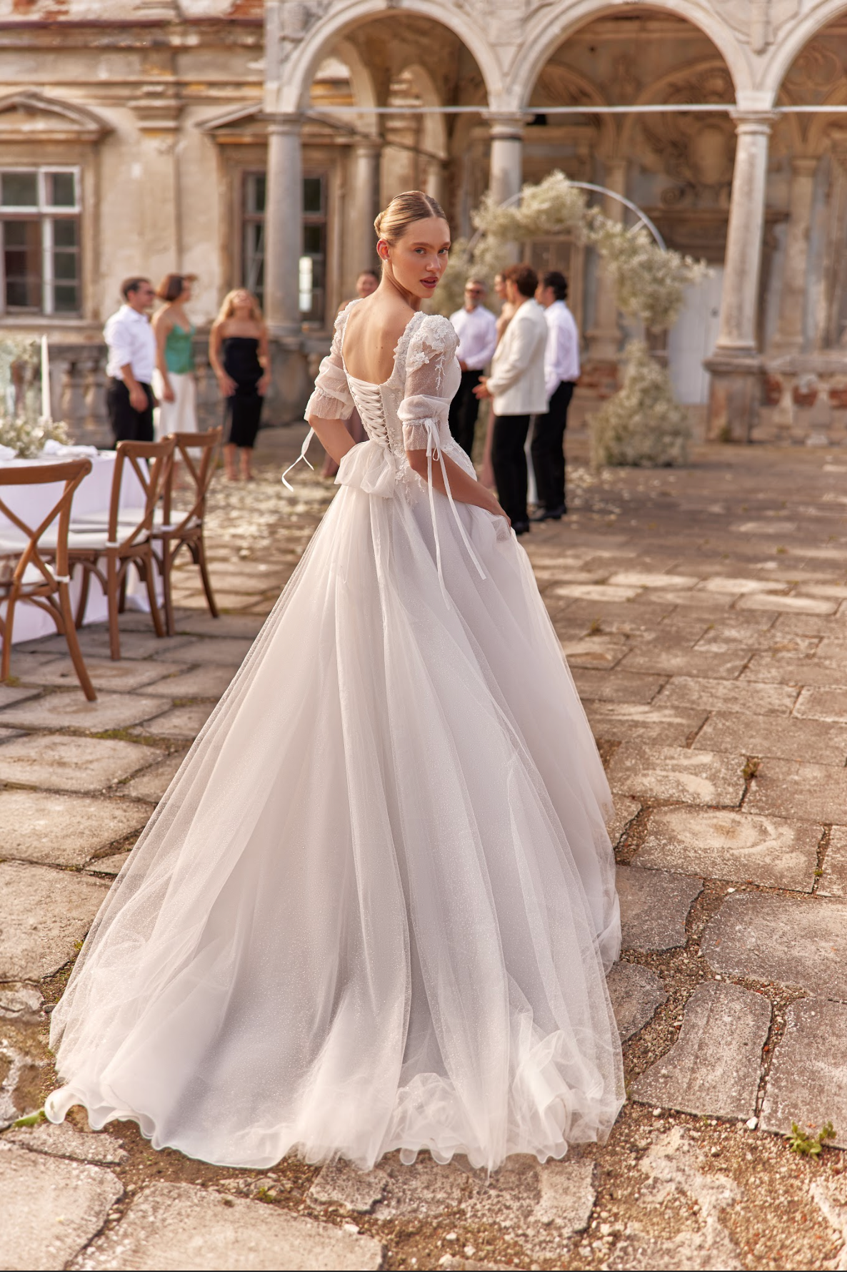 Loren Wedding Gown with lace corset bodice, sparkly tulle skirt, a-line and full silhouette, long skirt with train